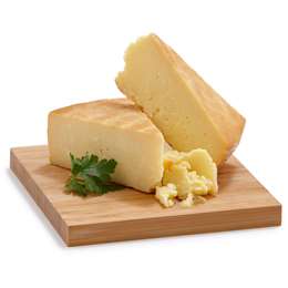 Singletons Black Wax Cheddar Cheese per kg | Woolworths